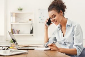 Person on a call and reviewing information